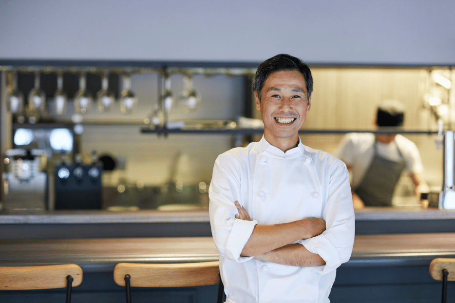 Kitchen staff member checking stock levels